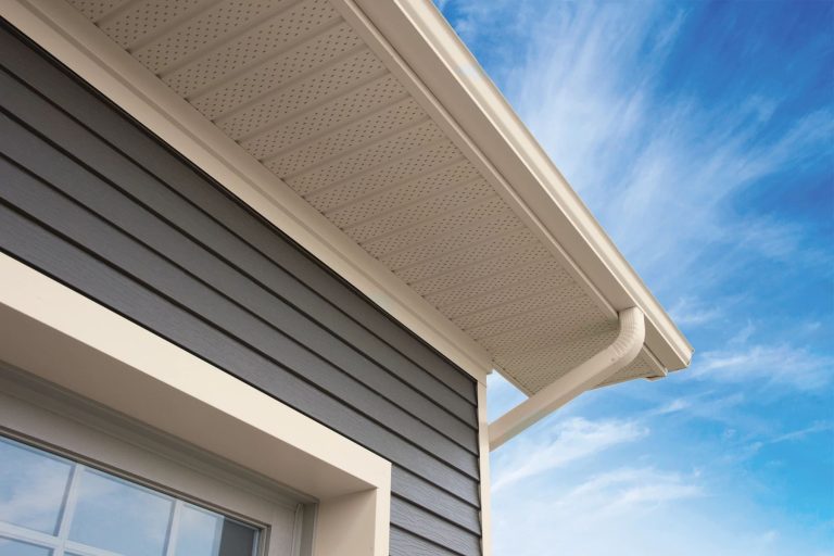 modern k-style beige gutter with downspout